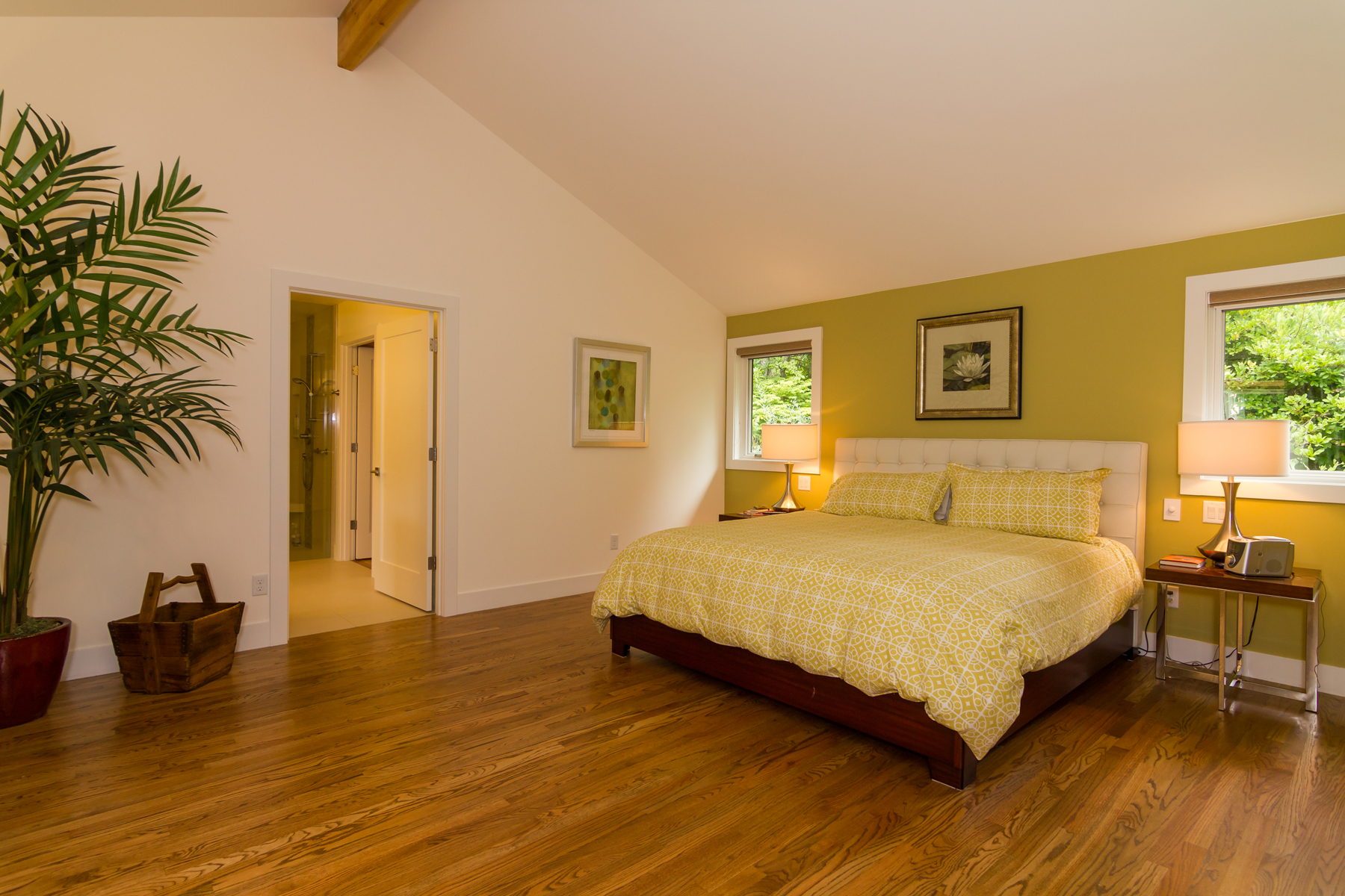 New master bedroom as part of a 800 square foot addition to house. Ceiling height matching roof pitch creates an open, comfortable space. 