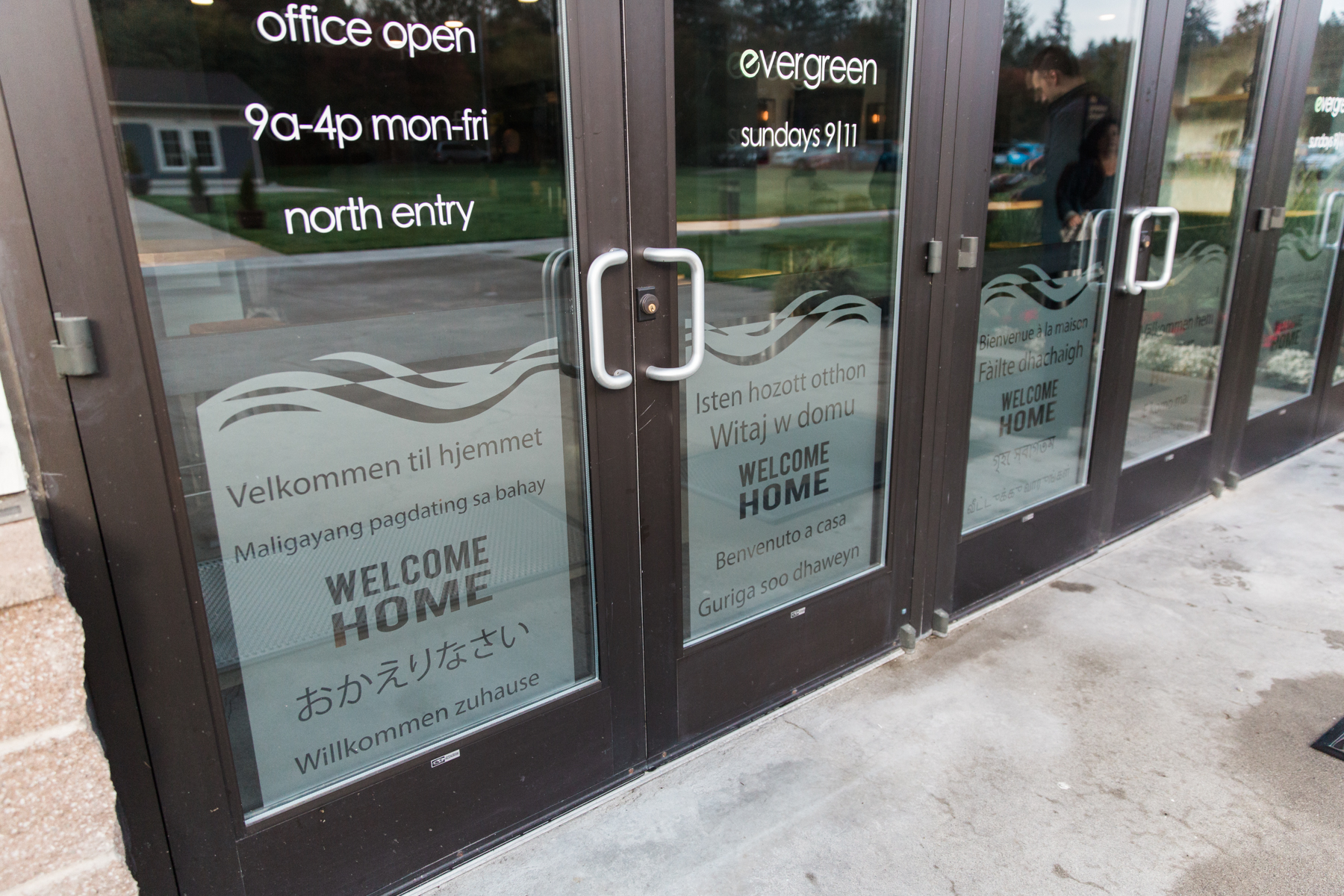 “Welcome Home” is printed in 70 different languages across Evergreen’s doors.