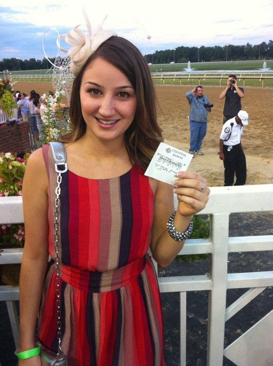 My BFF Michelle with a winning across-the-board ticket at the 2012 Virginia Derby... on my tip. 
