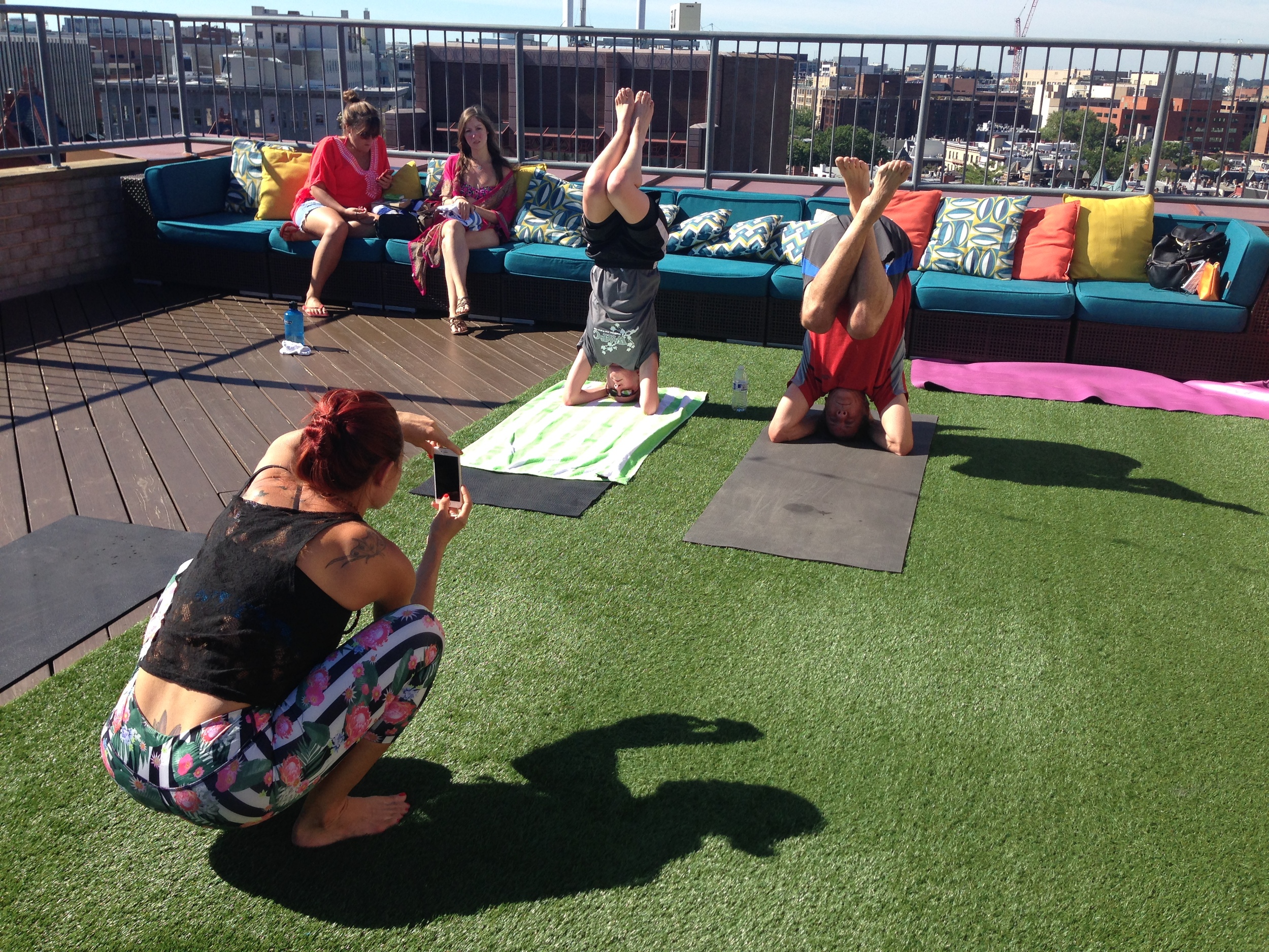 Here are some people doing something that looks very uncomfortable (er, relaxing) on the roof of the Embassy Row Hotel.