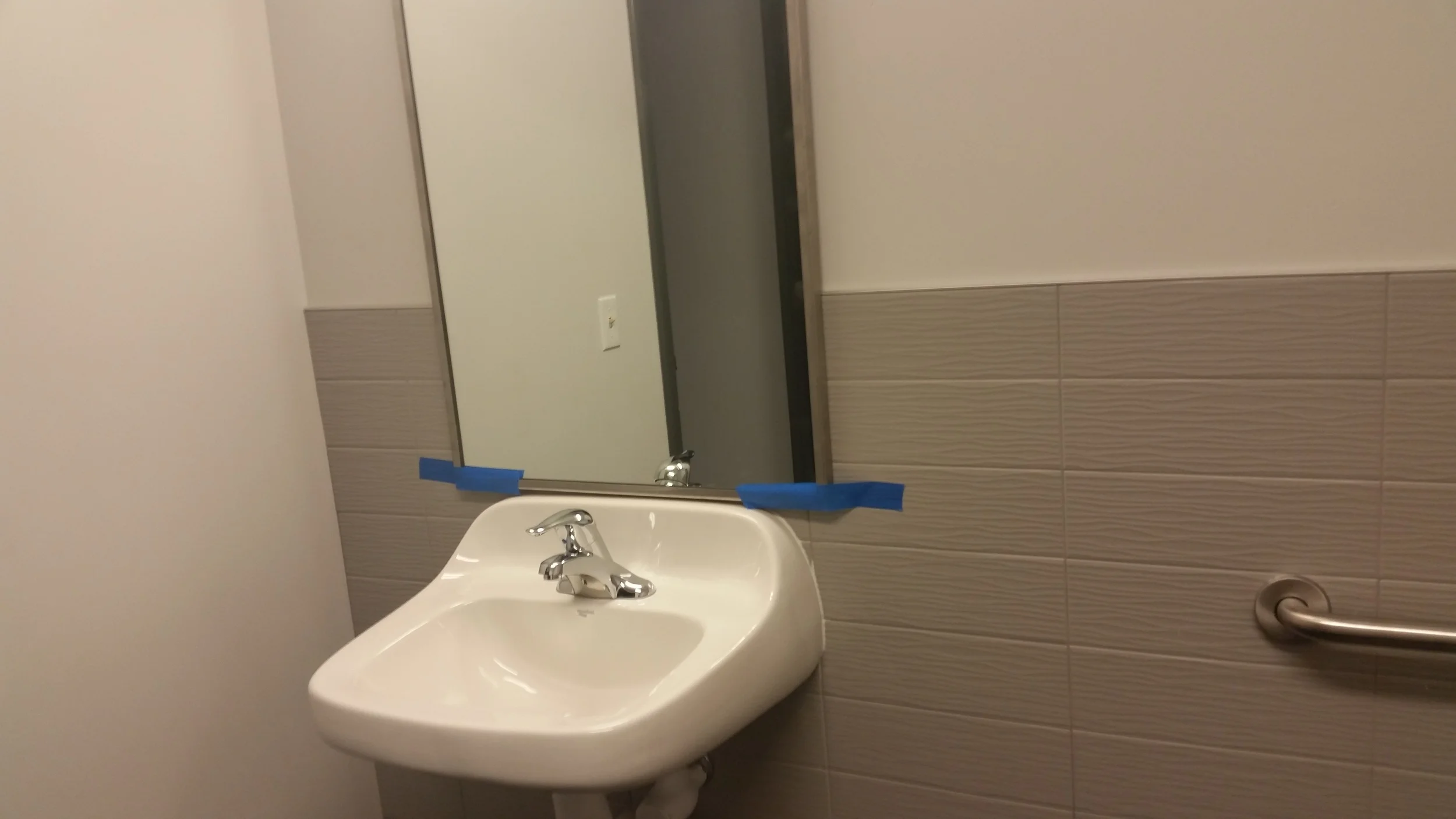 Bathroom wall tile is from DalTile. I love the glass ripple effect!