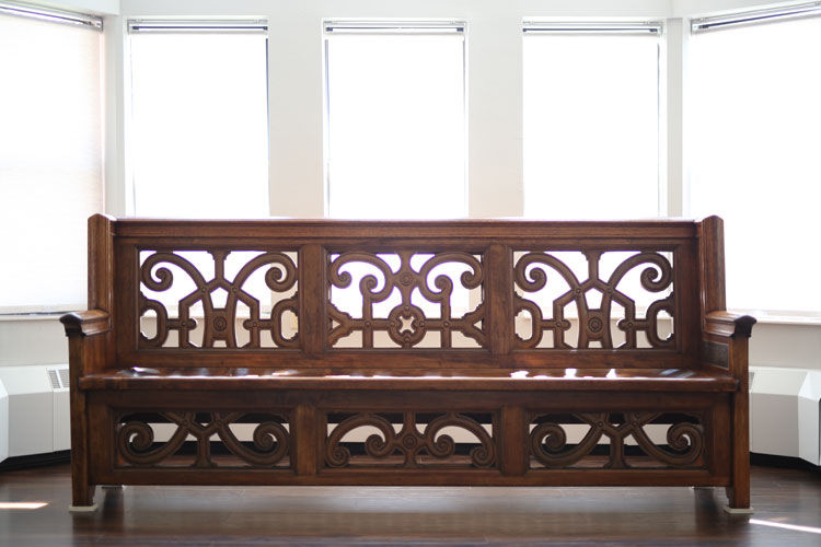 Custom bench crafted from the original Emerson Hall staircase. 