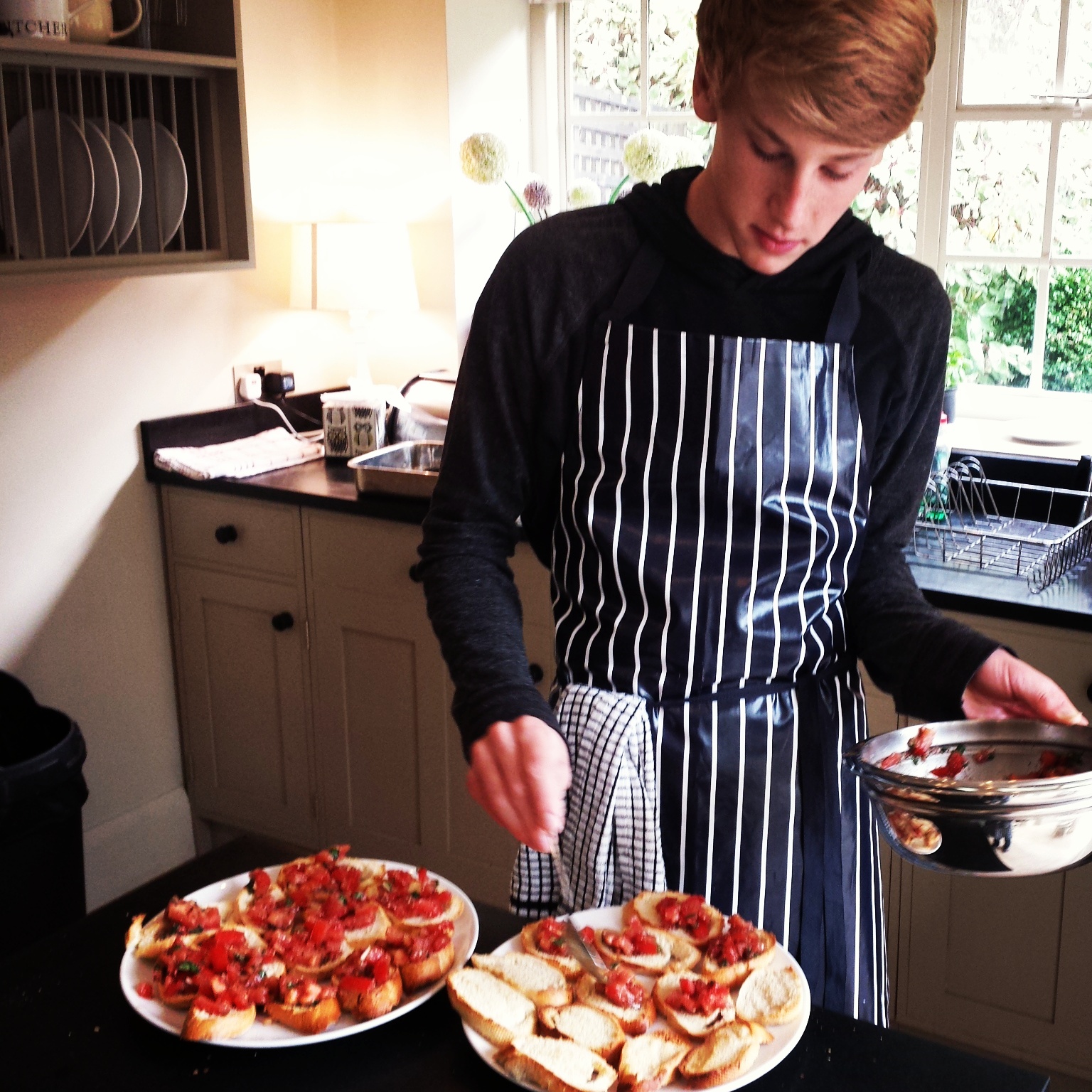 Peter putting together the Bruchetta