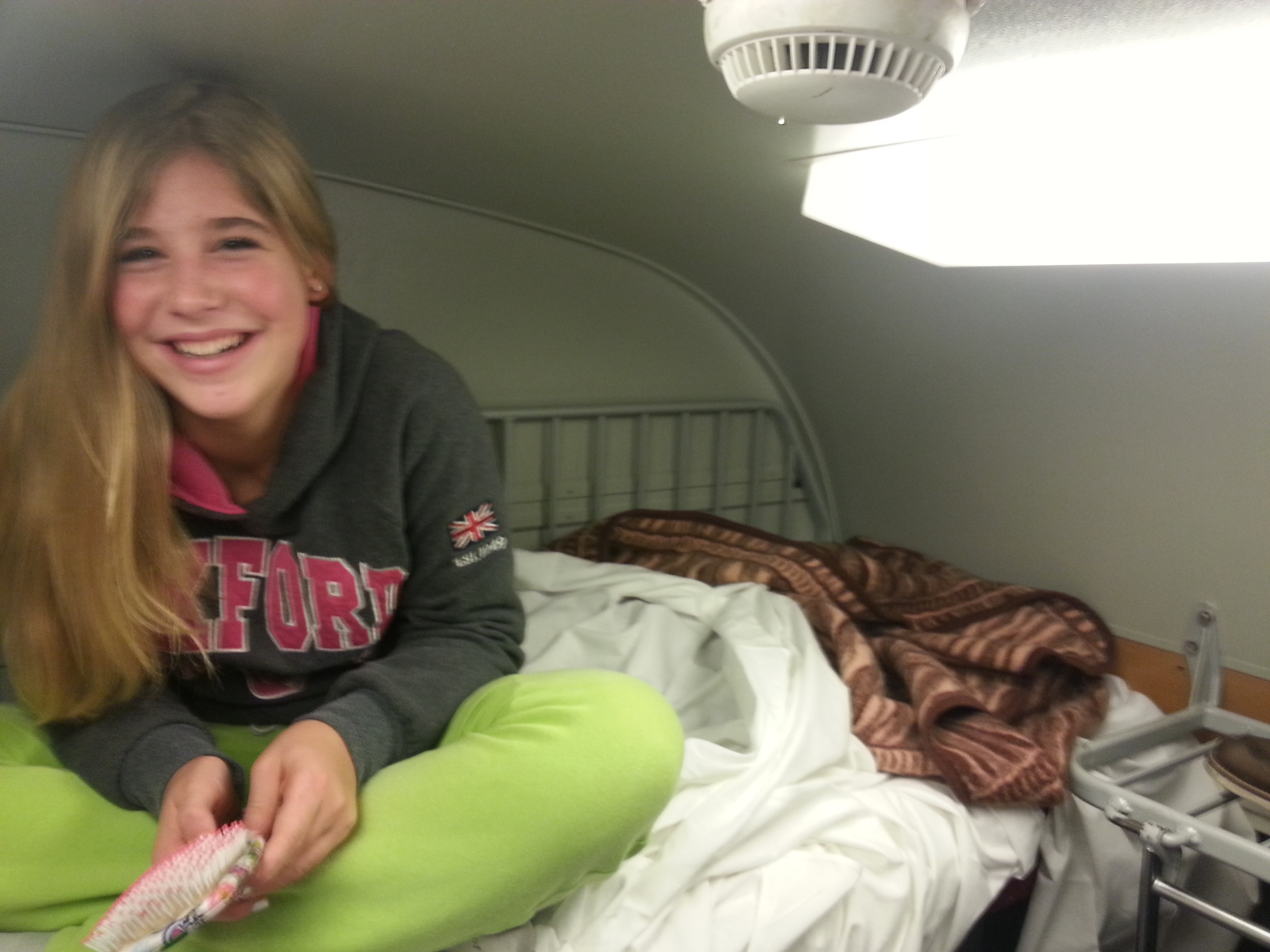 Having fun on the top bunk
