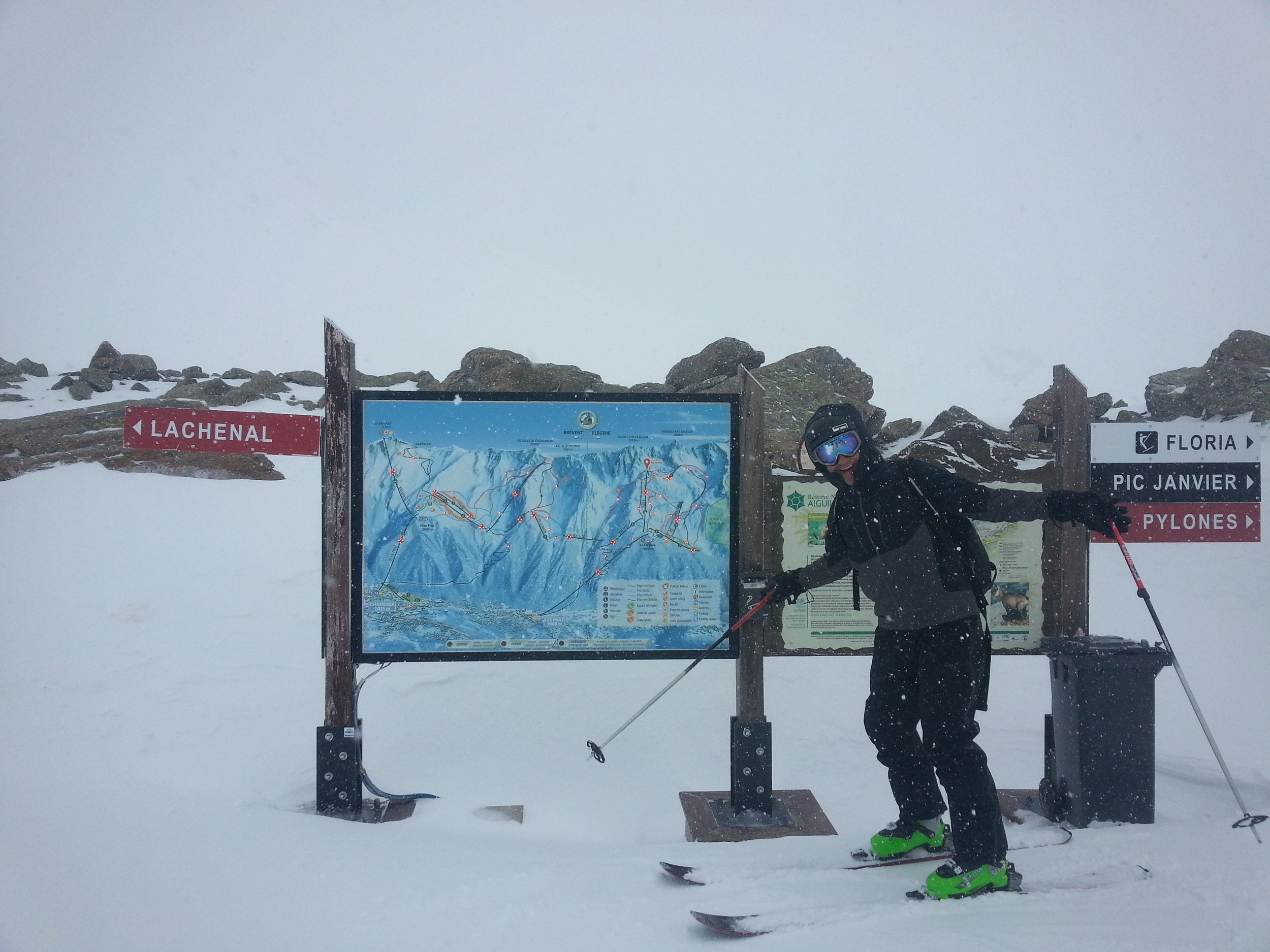 Pete standing next to the lift status sign (all the lifts are red) 