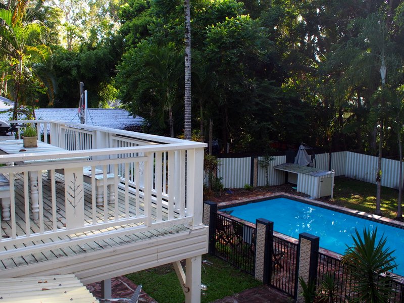 The pool and upstairs balcony