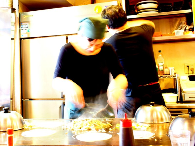 Making the crepe right in front of you - this lady did EVERYTHING!