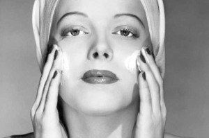 womanapplyingcreamtoface-300x199.jpg