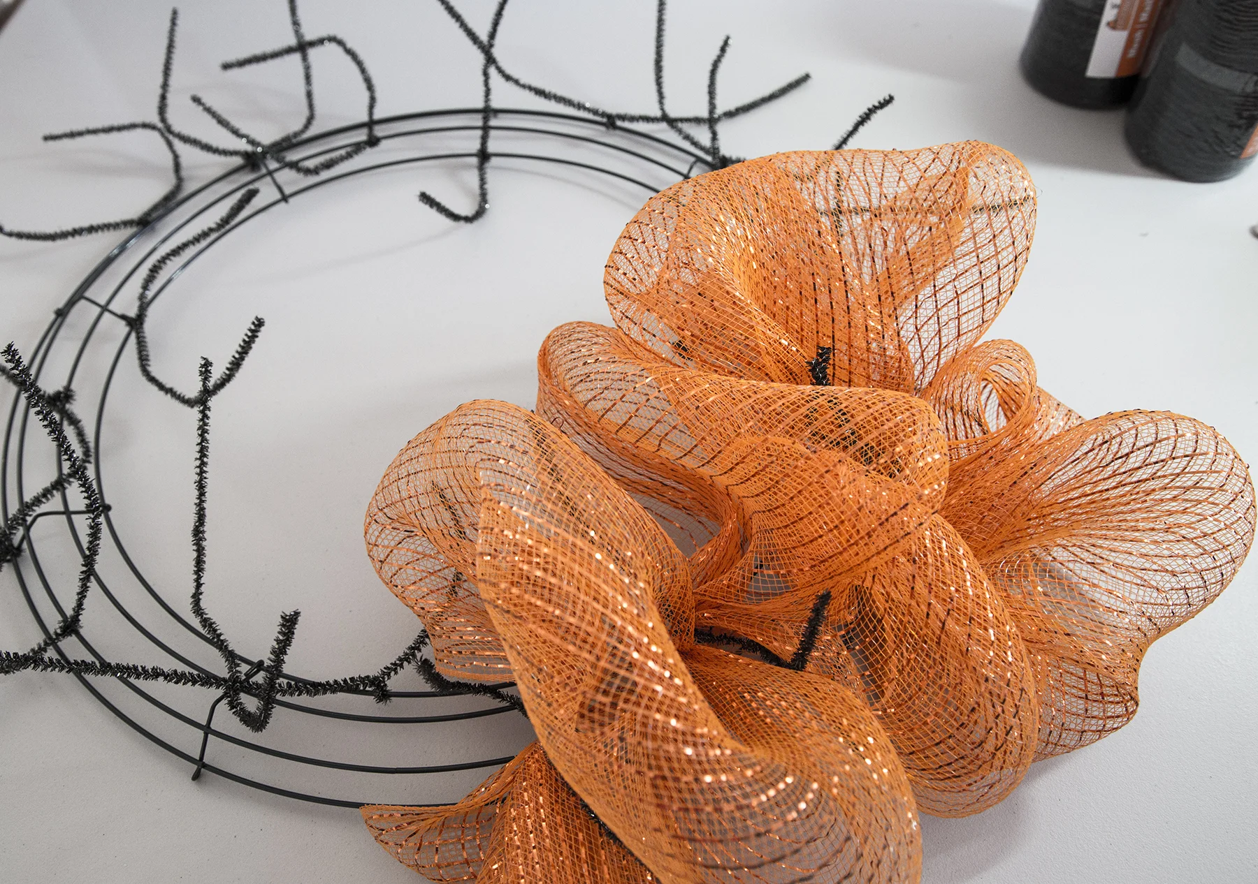 Starting the first layer of mesh - secure with the chenille twists