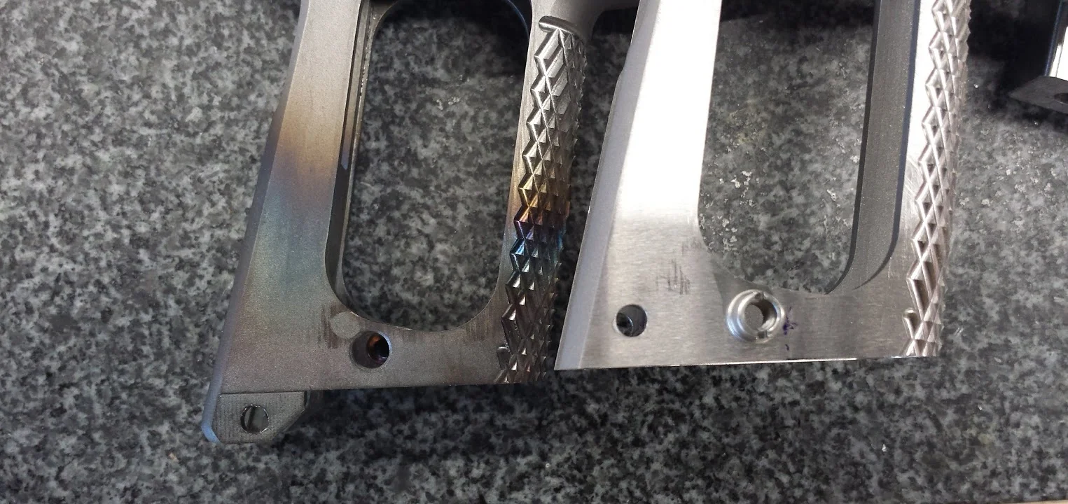 7. Left: Frame cut for GEN 1 Chen Magwell Right: Frame cut for GEN 2 Chen Magwell. Entire bottom of frame is shortened. The Mainspring Housing Pin Hole is relocated to a different location.