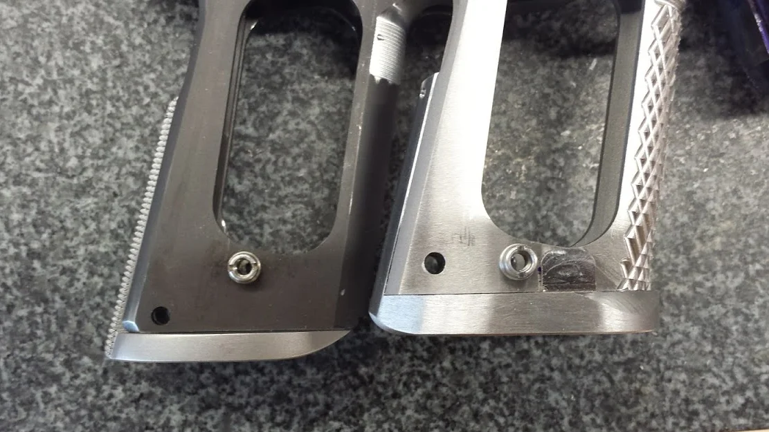 9. Left: Standard 1911 frame with Smith and Alexander attached. Adds length to pistol Right: Modified frame with GEN 2 Chen Magwell attached. Mainspring Housing Pin Hole is relocated, and a shorter Mainspring is used.