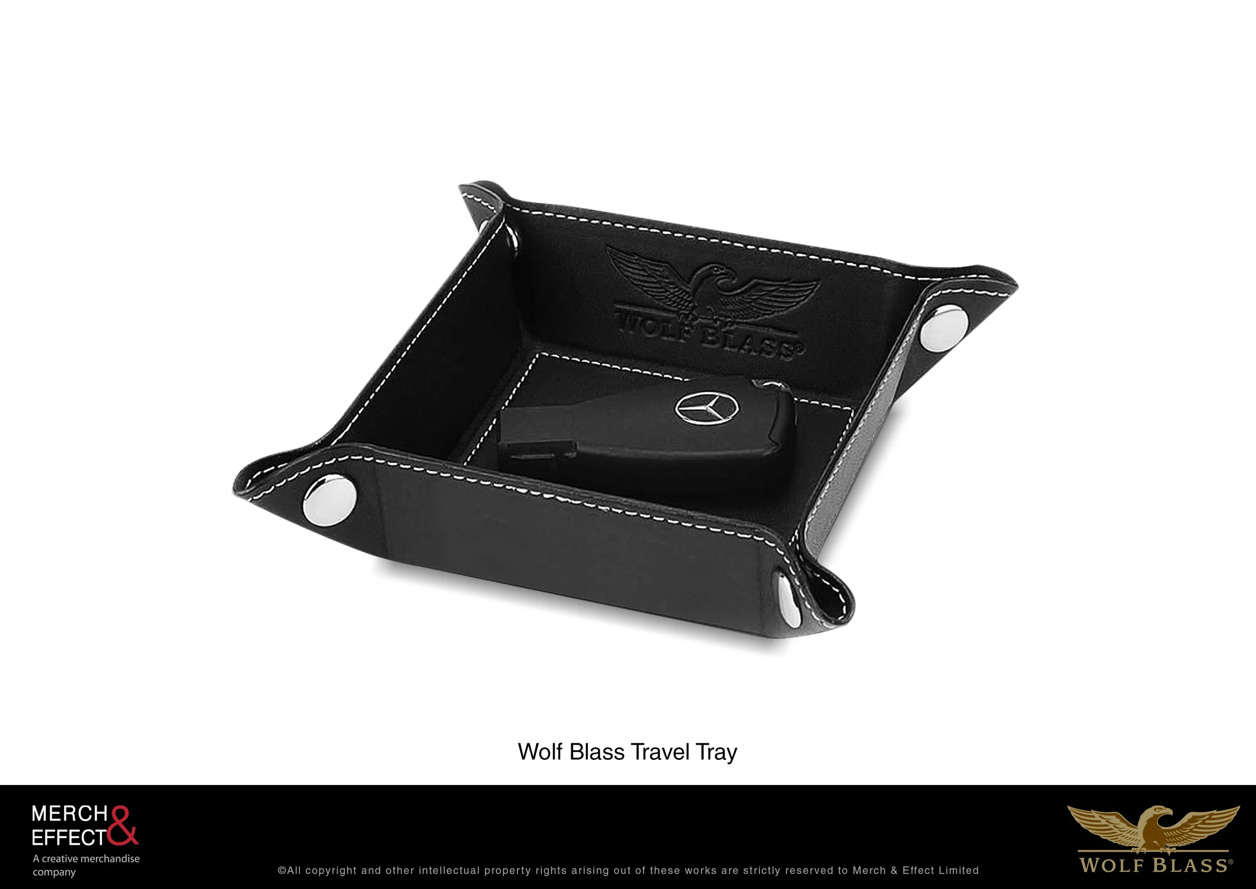  Travel in style with this exclusive Wolf Blass Travel Tray. Made as a GWP for Treasury Wine Estates' Wolf Blass Gold Label Wines, this travel tray comes in a classic black box with gold logo of Wolf Blass, while the item itself is debossed with the 