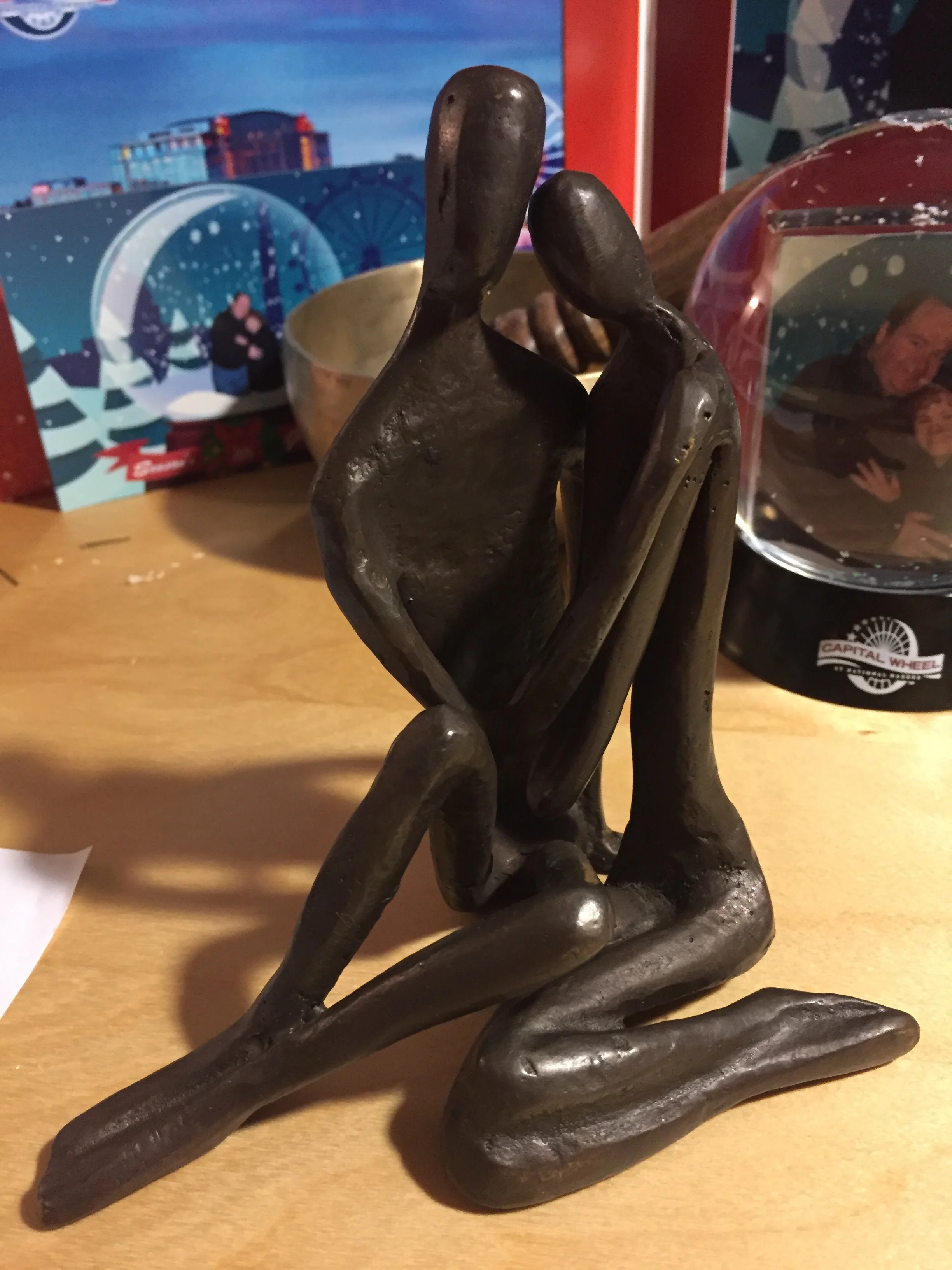 A couple, embracing.