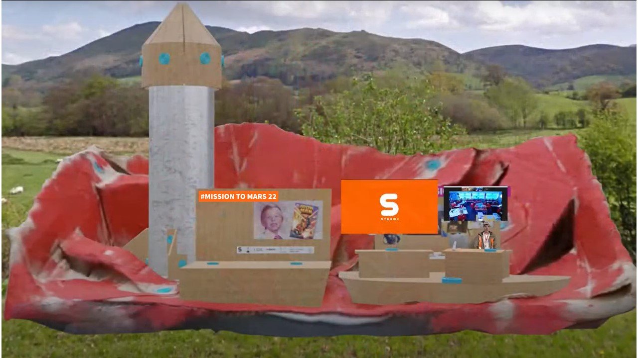 STEAM Co OurMillion22 launch day at St Lawrence Primary - The cardboard Mars base camp virtual set in the live stream .JPG