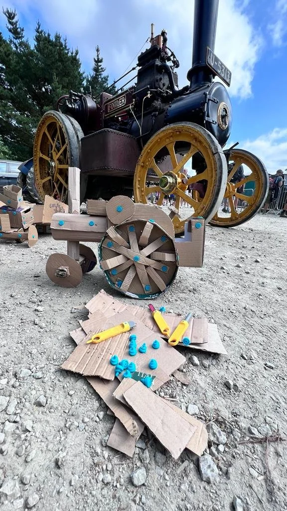 Cardboard traction engne and scruws.jpeg