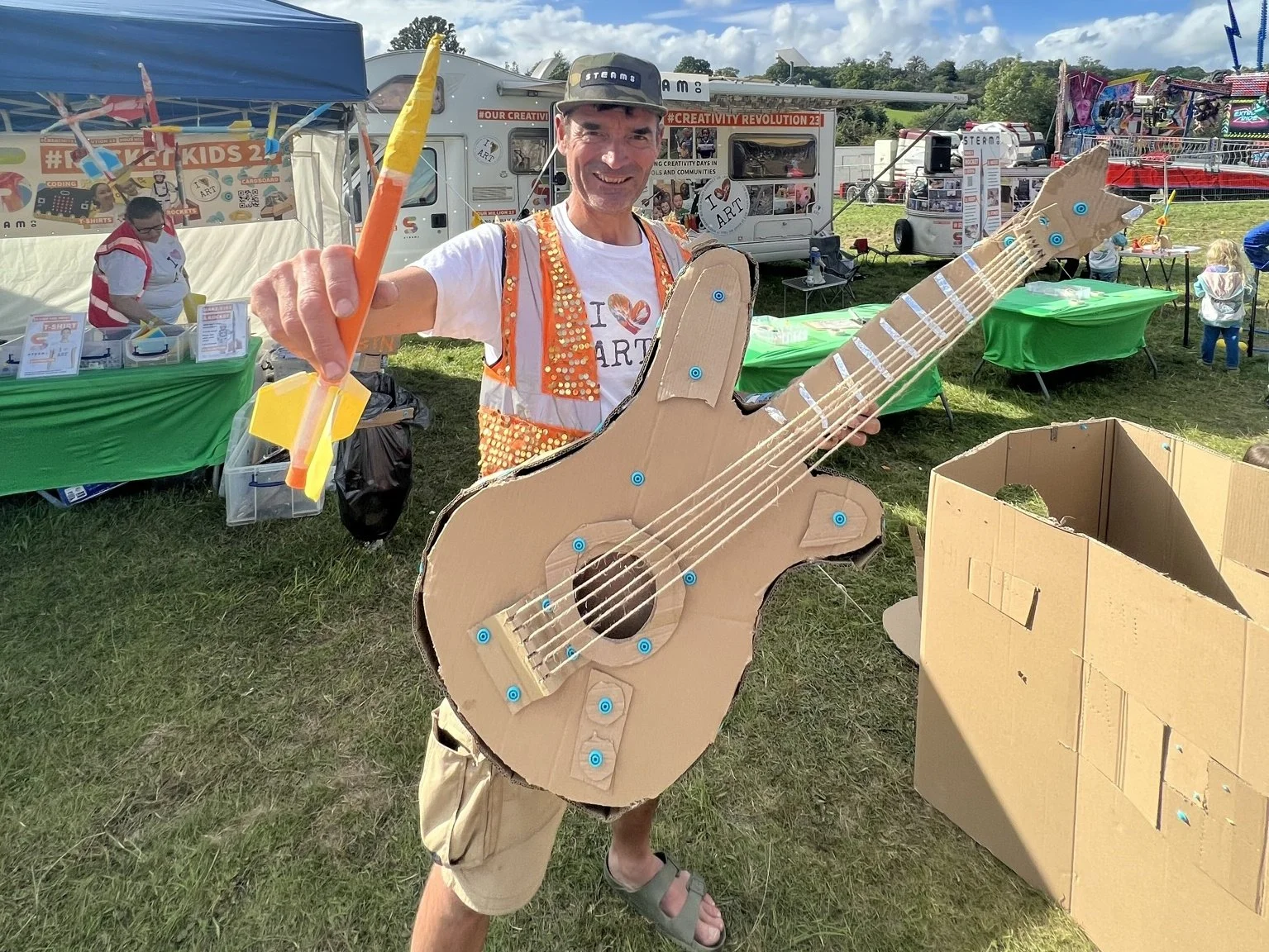 SCOLF23 Nick with Cardbaord guitar and rocket 3x4.JPEG