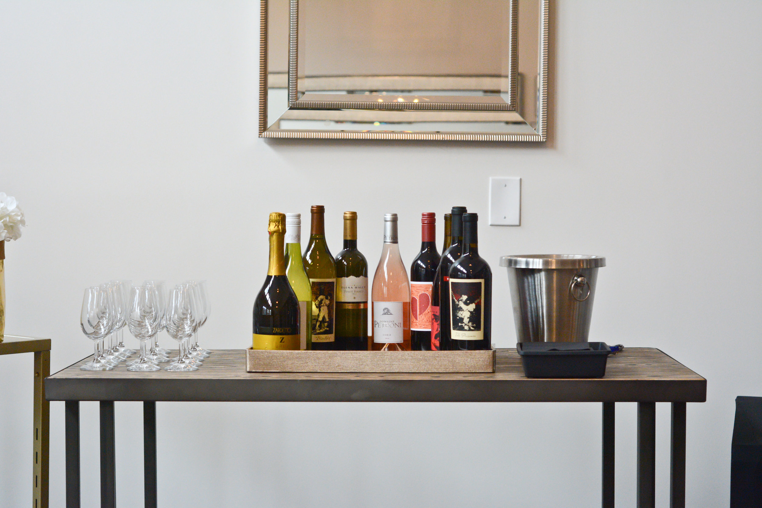 Corks-and-Cuvée-Shoppe-Wine-Table-Showcase
