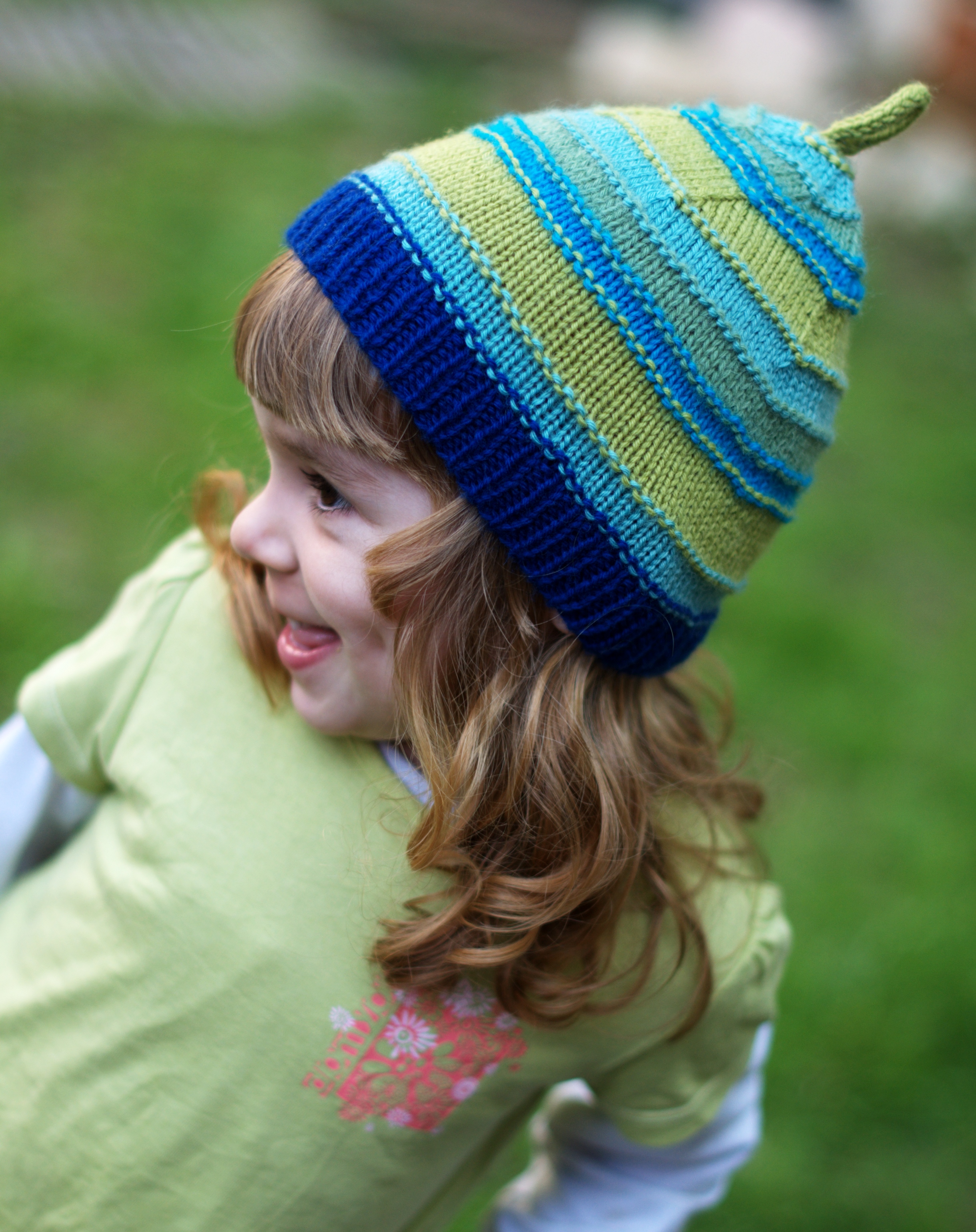 Trullo childs striped pixie hat knitting pattern