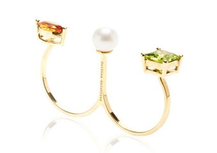 Delfina Delettrez Peridot and Marquee Triple Ring, $955, available at Moda Operandi .