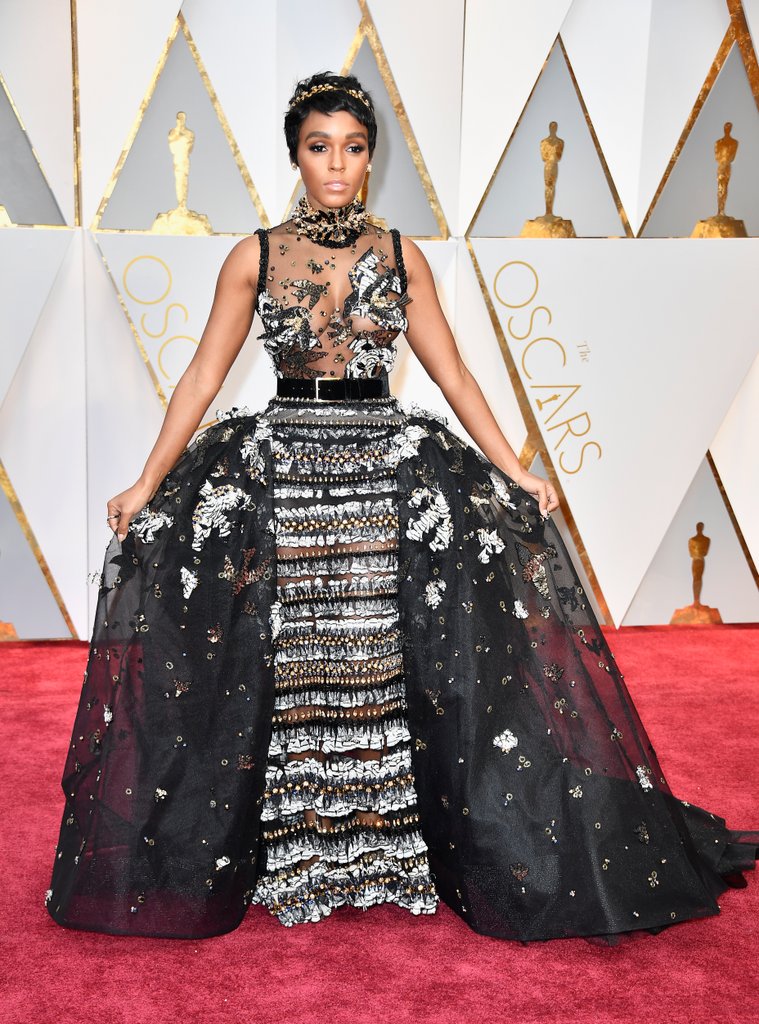 Chanelling an Audrey Hepburn-esque princess, Janelle Monáe shines in Elie Saab Haute Couture, Jennifer Behr crown, Forevermark jewels, and Brian Atwood shoes.