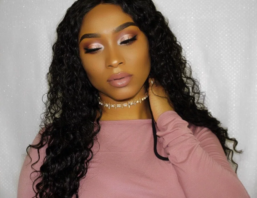 Our gorgeous Indique Soho Client Care Liaison, Khadeen, is wearing Indique's PURE Curly hair with a Curly Closure! 