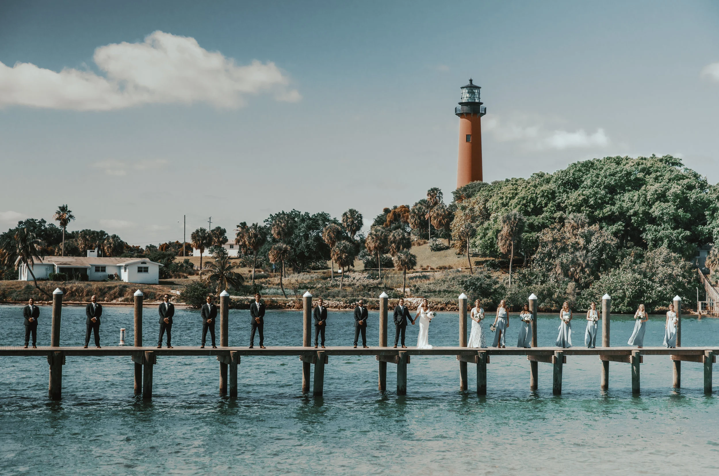 Wedding ceremony at The Pelican Club with Jupiter Lighthouse in background