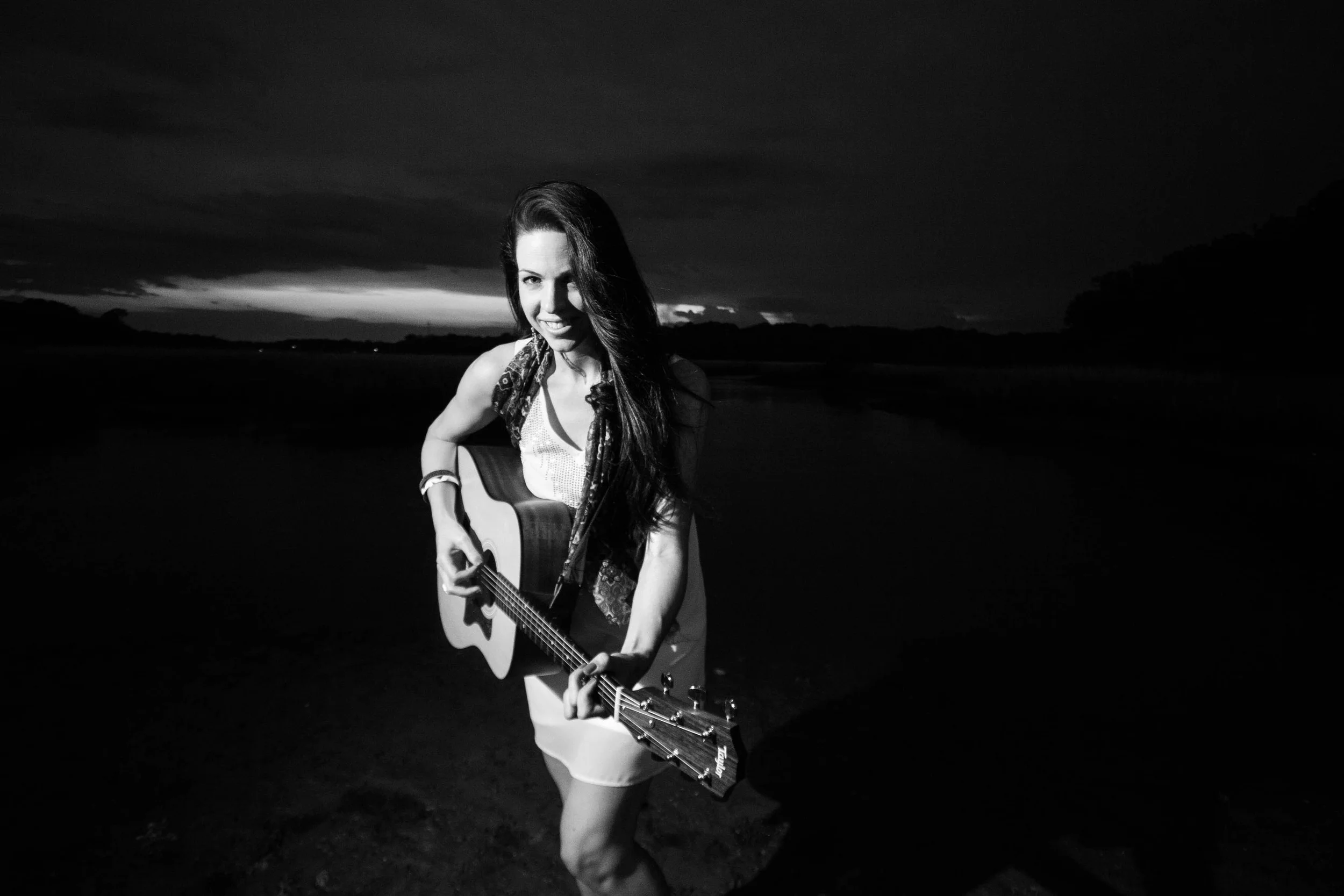 Em plays Singer Songwriter Spotlight at Rain dogs