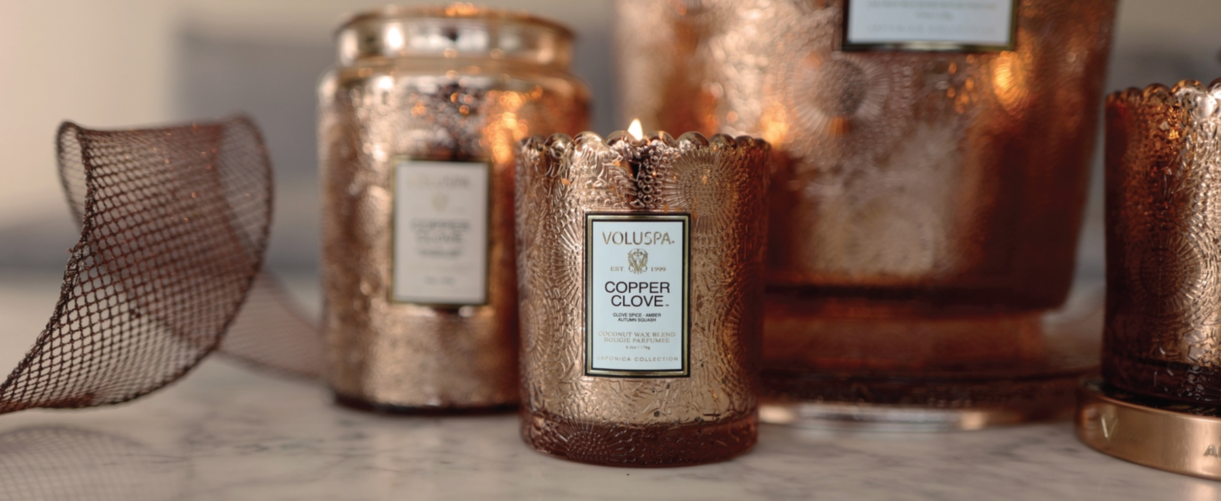 SEASONAL SCENTS Fill a decor lovers space with the seasonal scents of Clove Spice, Amber and Autumn Squash. You really get two gifts for the price of one - the beautiful embossed glass case is too pretty to throw away and will house a multitude of household goods beautifully long after the coconut wax has burned away.