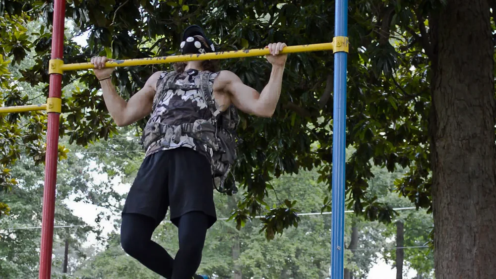 Perform each set of pullups til failure. Go until you can't get that chin over the bar and then push for one more after that. The final reps in each set is what makes the muscles grow. 
