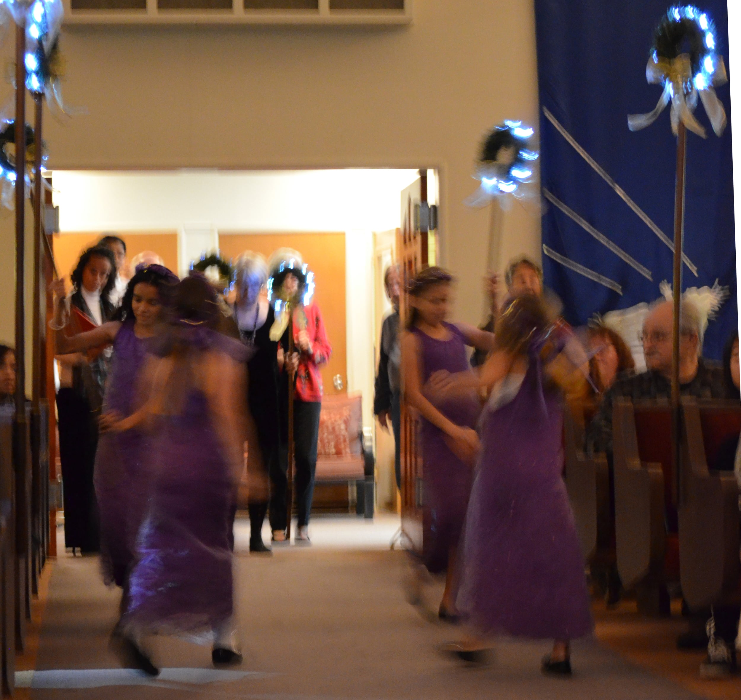 Acolytes in a blur of motion