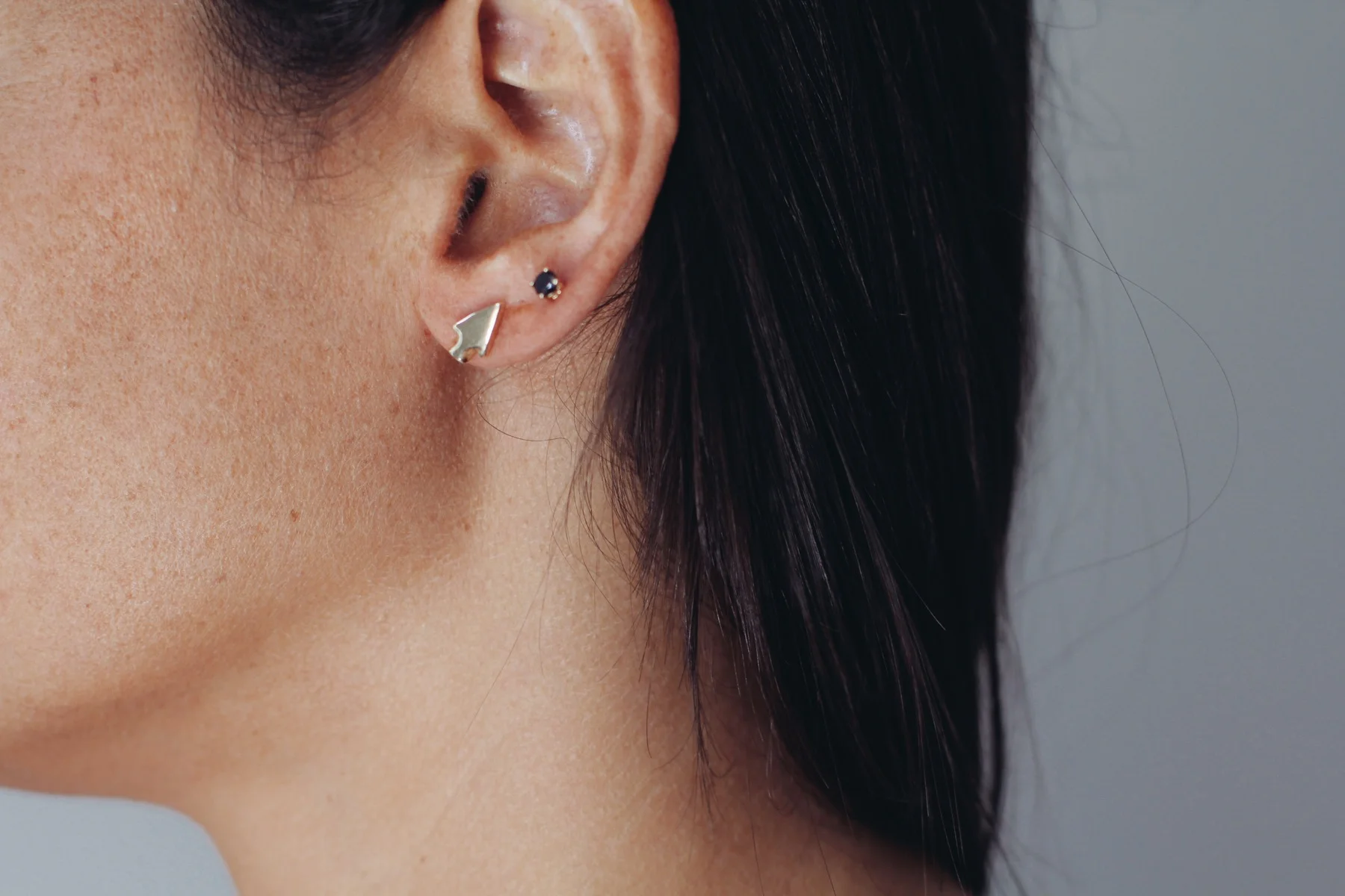 yellow arrowhead and black stud.JPG