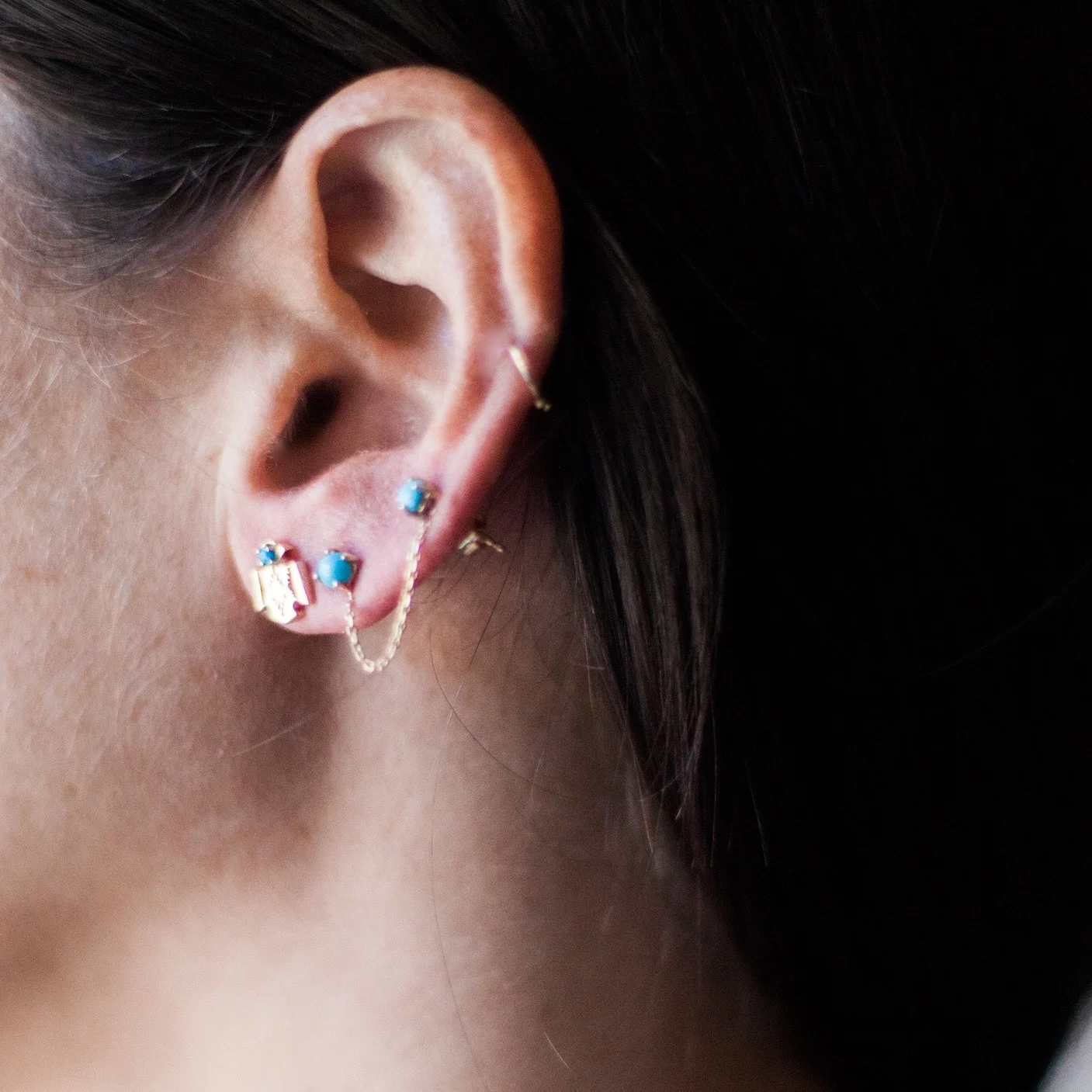 thunderbird stud and chain earring.jpg