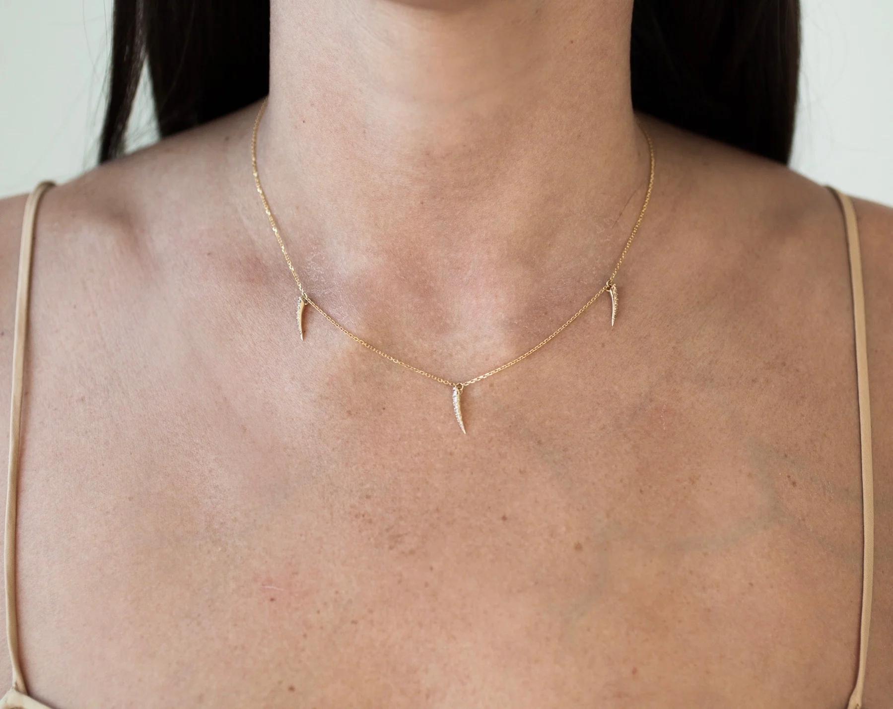 Triple white claw necklace.jpeg