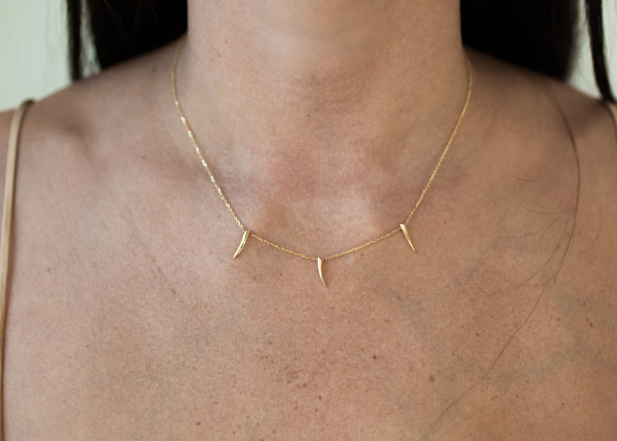 Triple claw necklace.jpeg