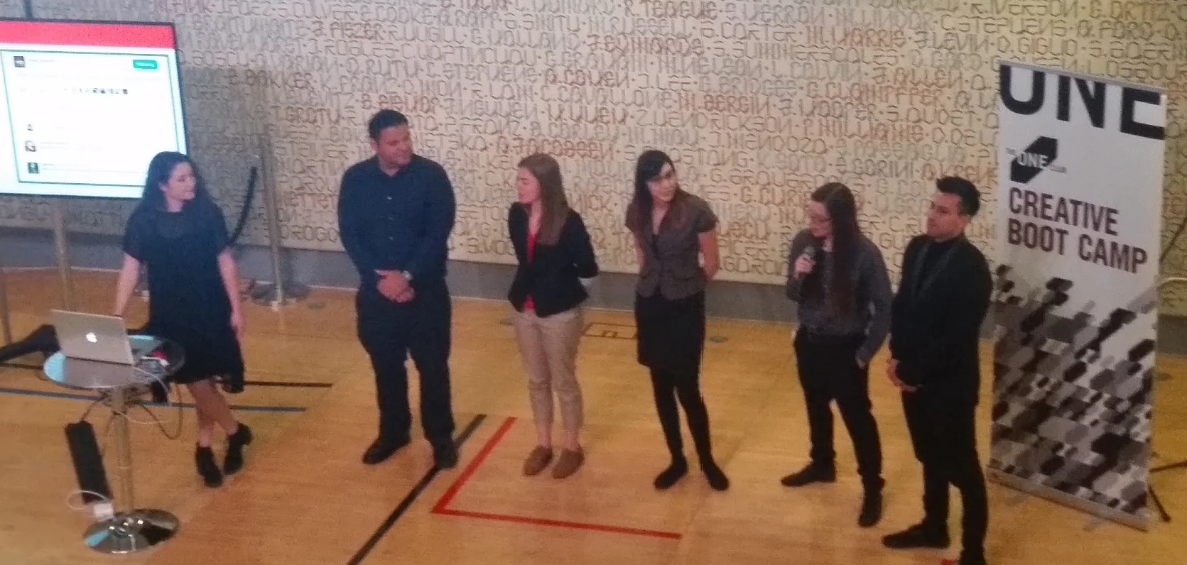 Brooke presenting with her team