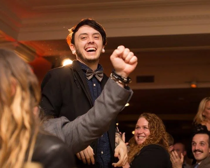 Christian (standing), hears that he won BOS at the ADDY event. (Photo by Brogen Jessup)