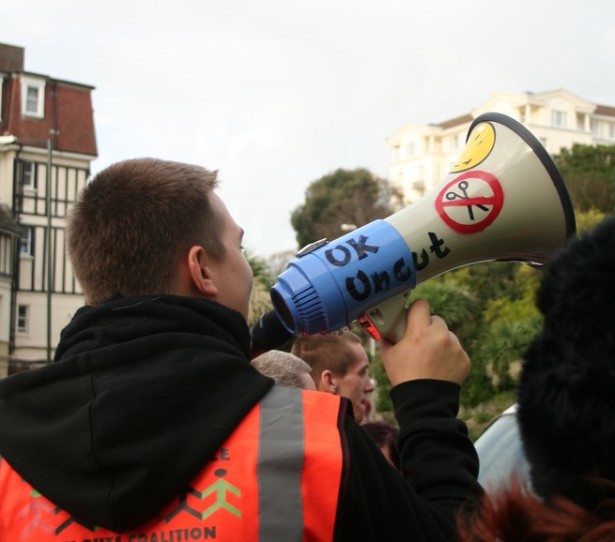 A man protests austerity and budget cuts in the United Kingdom during a massive labor strike on November 30, 2011. (Flickr/Claudia Gabriela Marques)