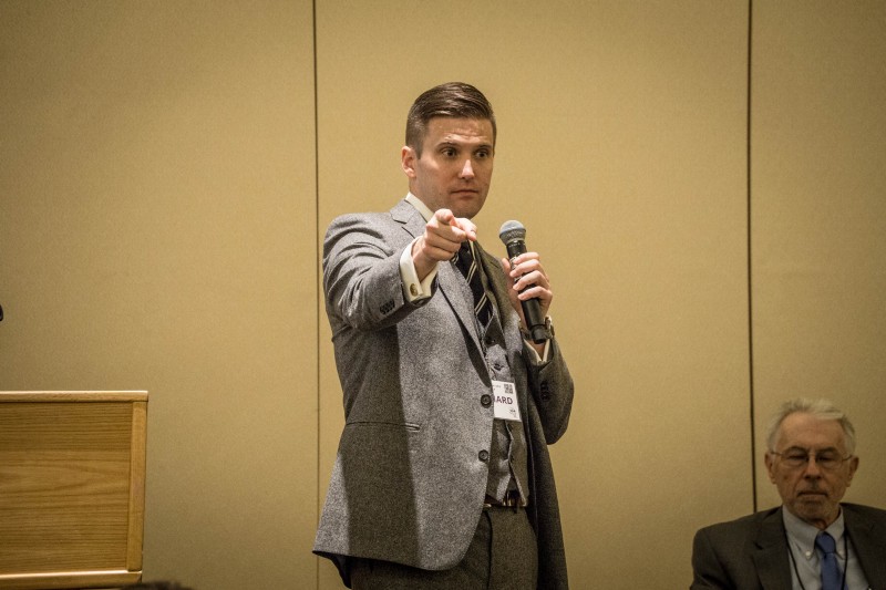 Richard Spencer takes the stage at “Become Who We Are,” a conference arranged by his National Policy Institute, Washington DC, November 19, 2016. Image: V@s , Flickr