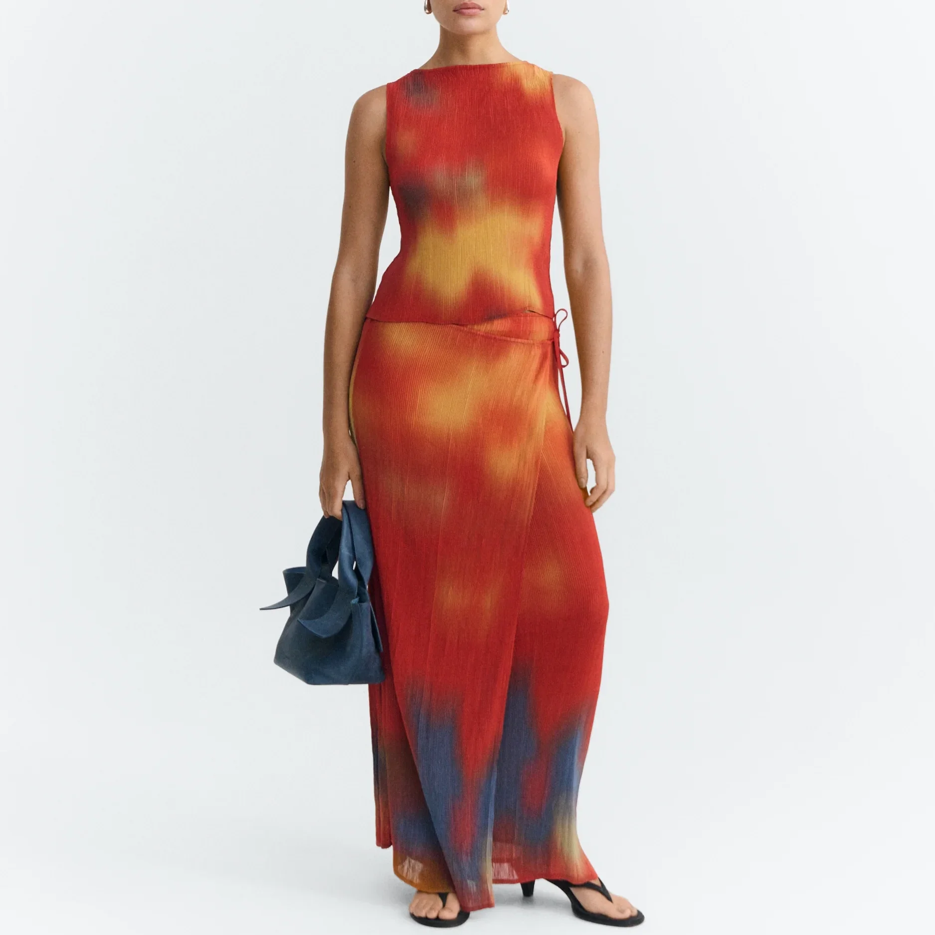Thinking_Mu_Pauline_Pleated_Skirt_Flowers_Red_Orange_1a.webp