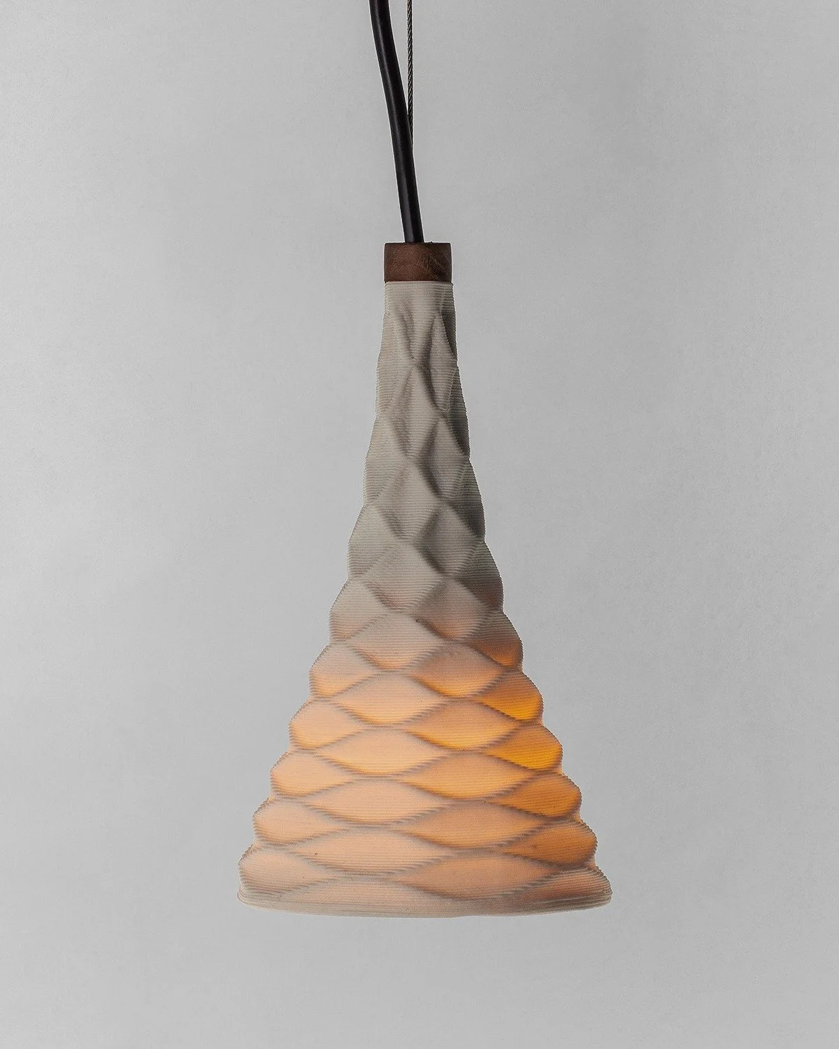 2024 Professional Pendant and Sconce Category Winner: 
A-Light by Pentograph

Oscillating between art and techne, the objective of A-Light is to insist on the wondrous potential of 3D ceramic printing, where innovation can be tied to beauty and funct