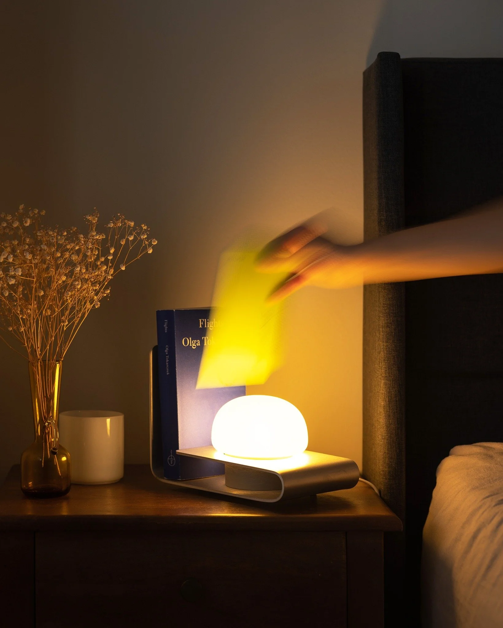 2024 Professional Table Category Winner (tie): 
Shelf Angle by Melody Chen

The Shelf Angle is a minimal table lamp that attends to life's simple pleasures. Whether it's the latest novel you can't put down or a warm cup of bedside chamomile, the Shel
