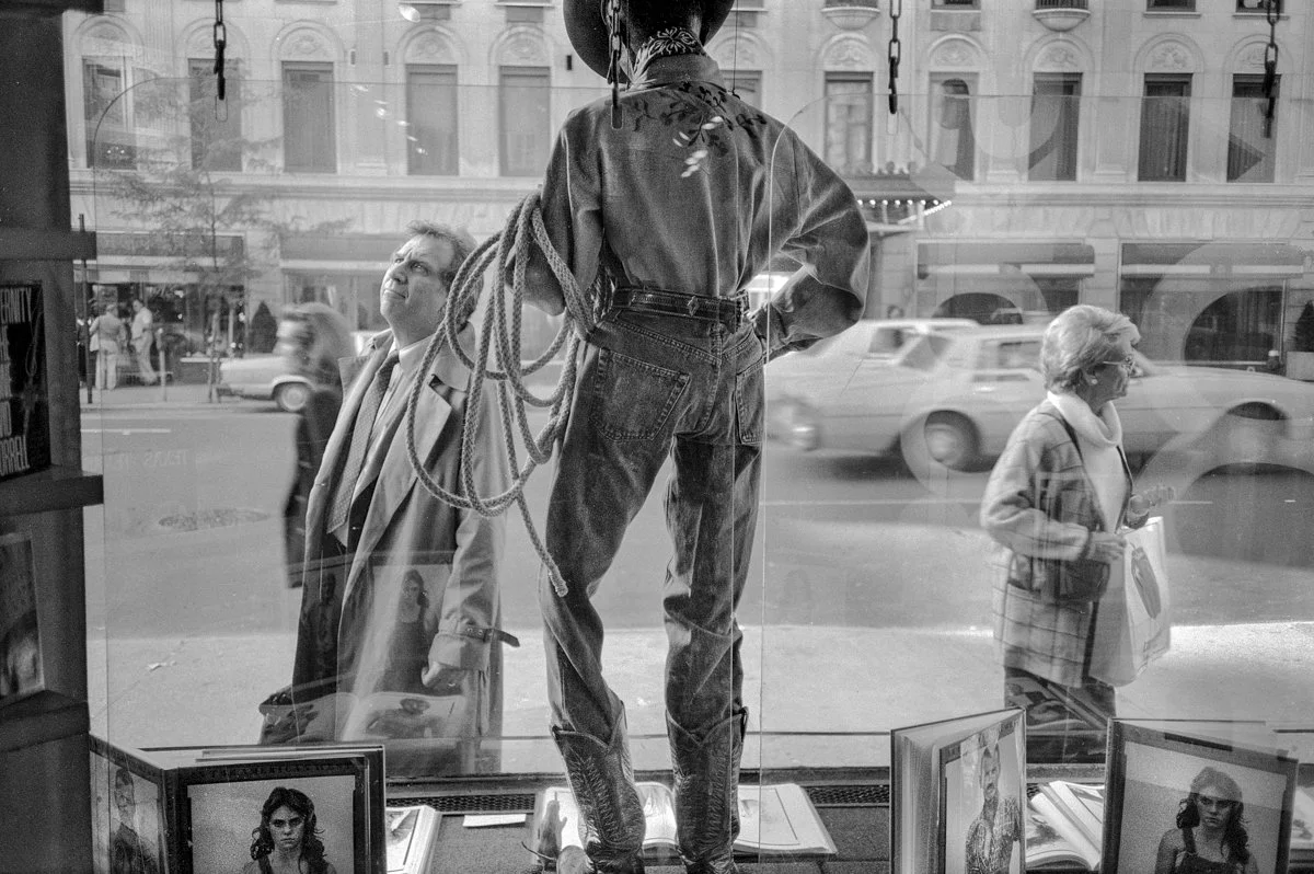 Cowboy maiquin looking out of bookstore 8637-22-Edit.jpg