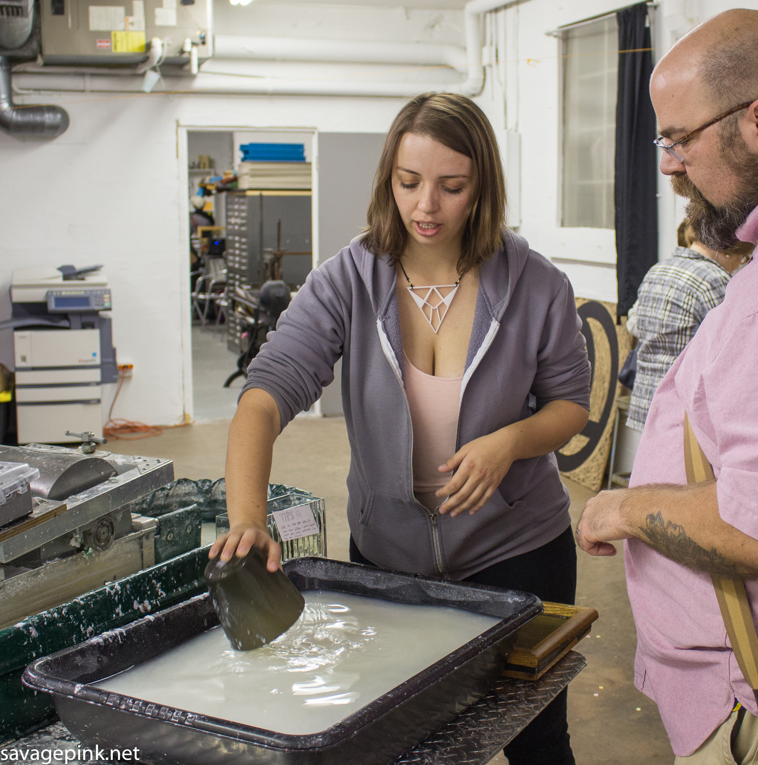 Ingrid demonstrates how to prepare a tub of paper pulp.