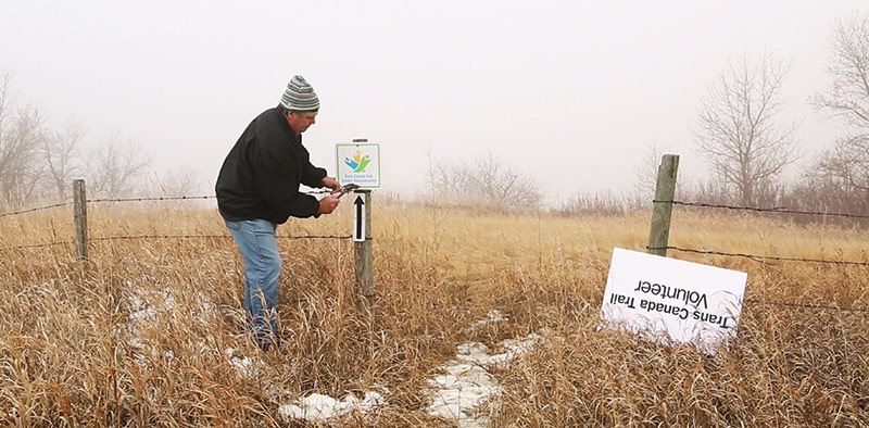 Mayor Bryan Matheson on the Saw Whet Trail in Lumsden, Saskatchewan, part of the TCT. Photo: Claire Sanford