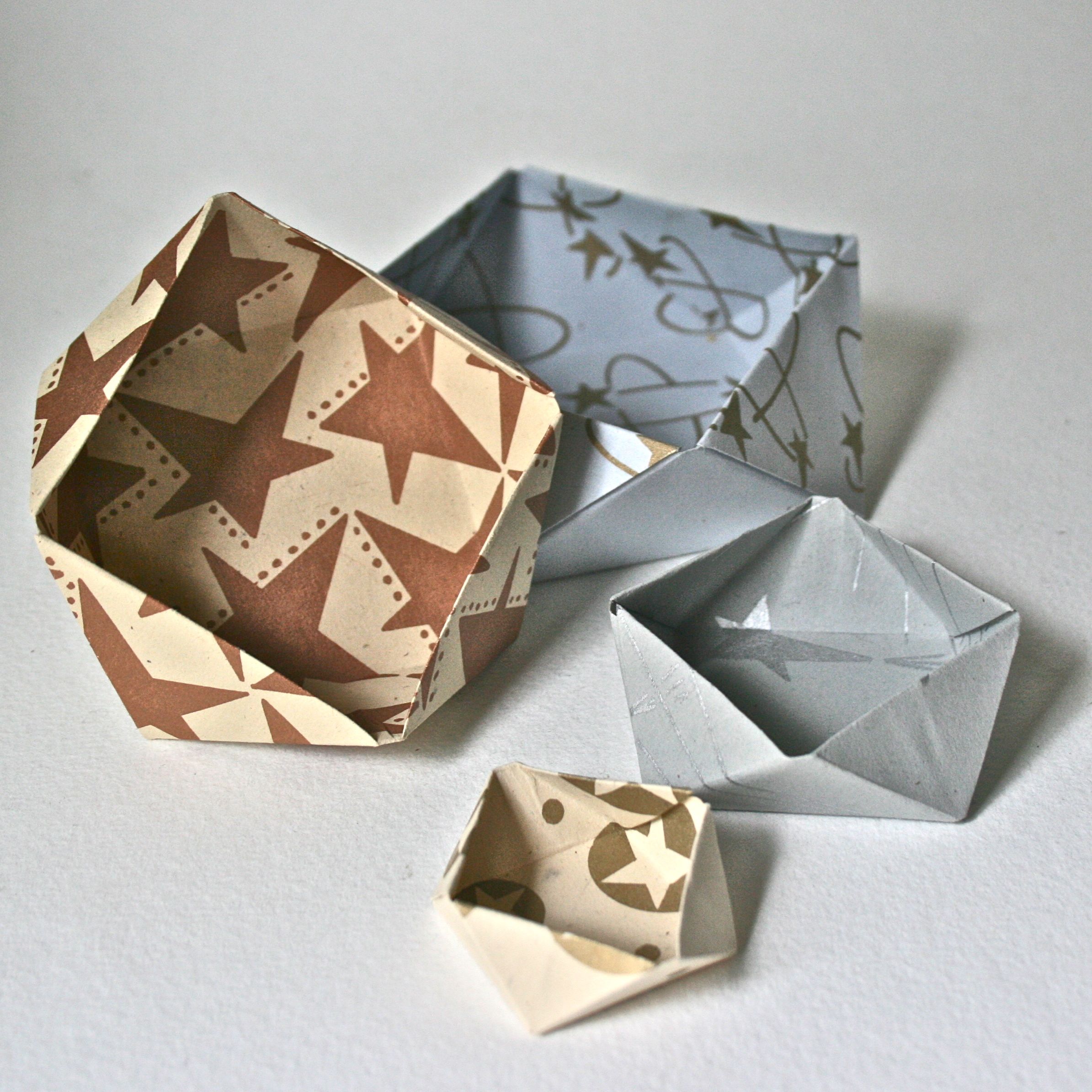 Decorative paper and a few crisp folds take a square into a third dimension