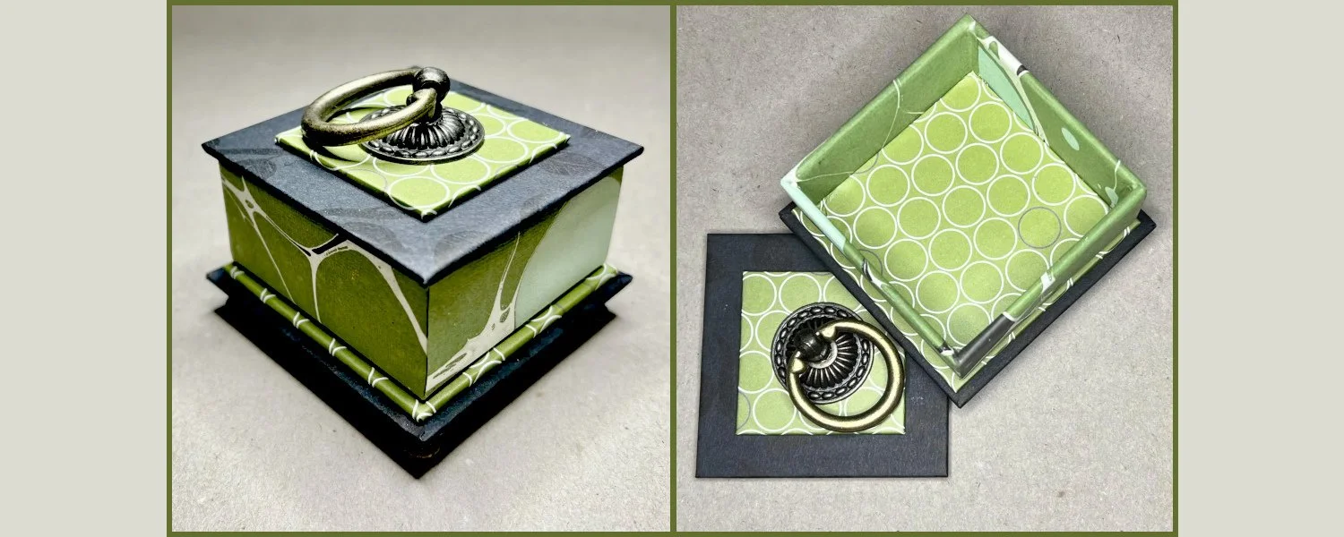 Green and black square gift box.