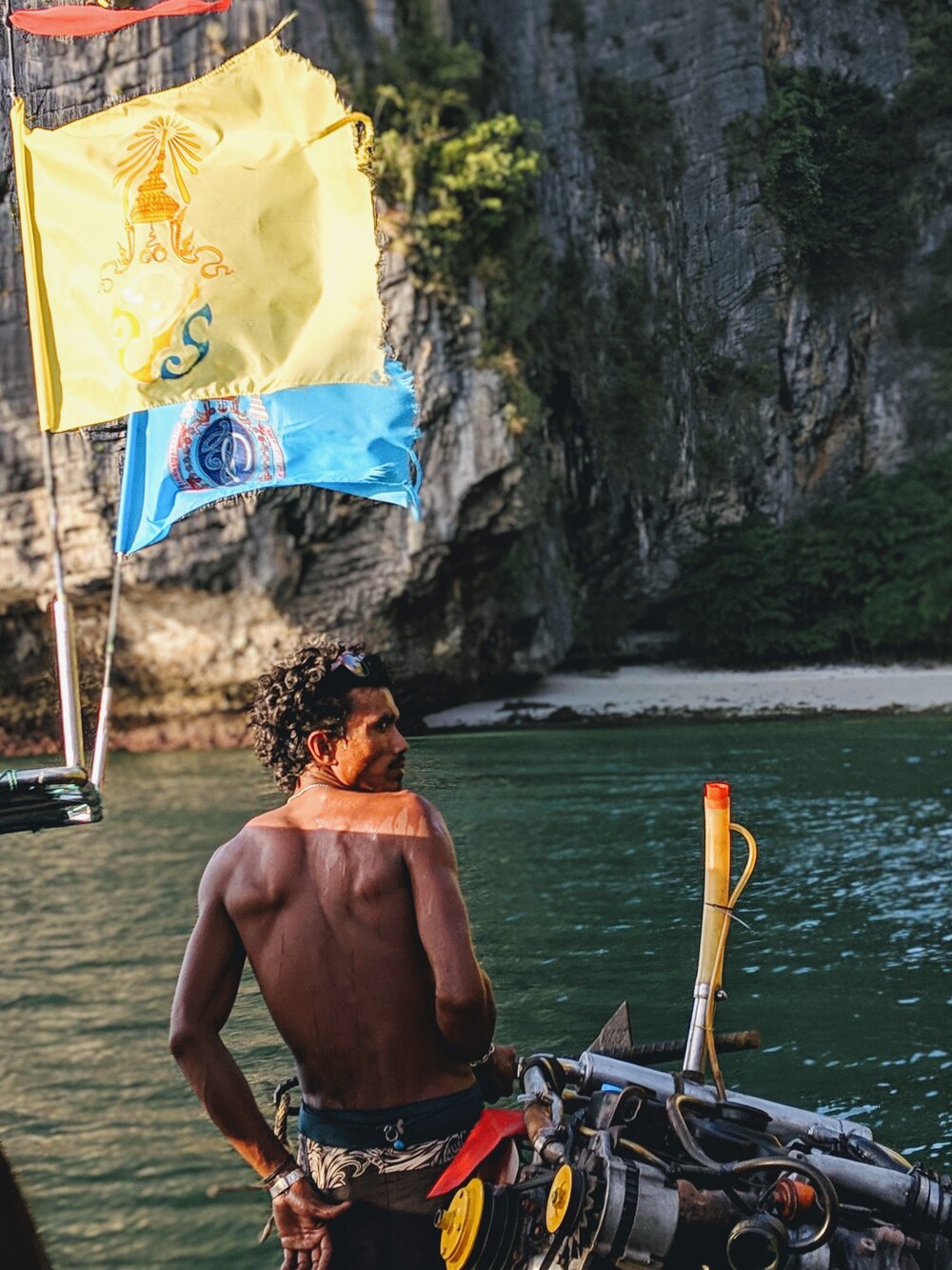 man-in-boat-krabi-thailand.jpg