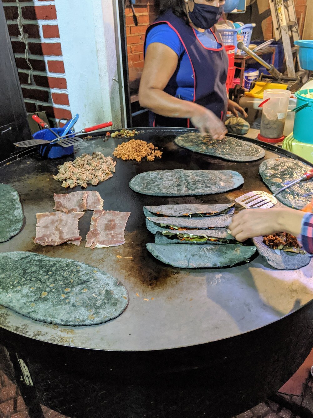 woman-cooking-blue-corn-tortillas.jpg