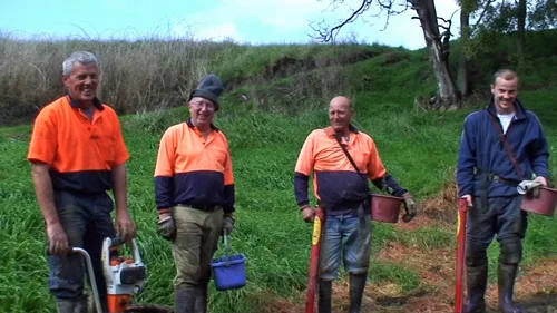 The planting team lead by Chris (far left)