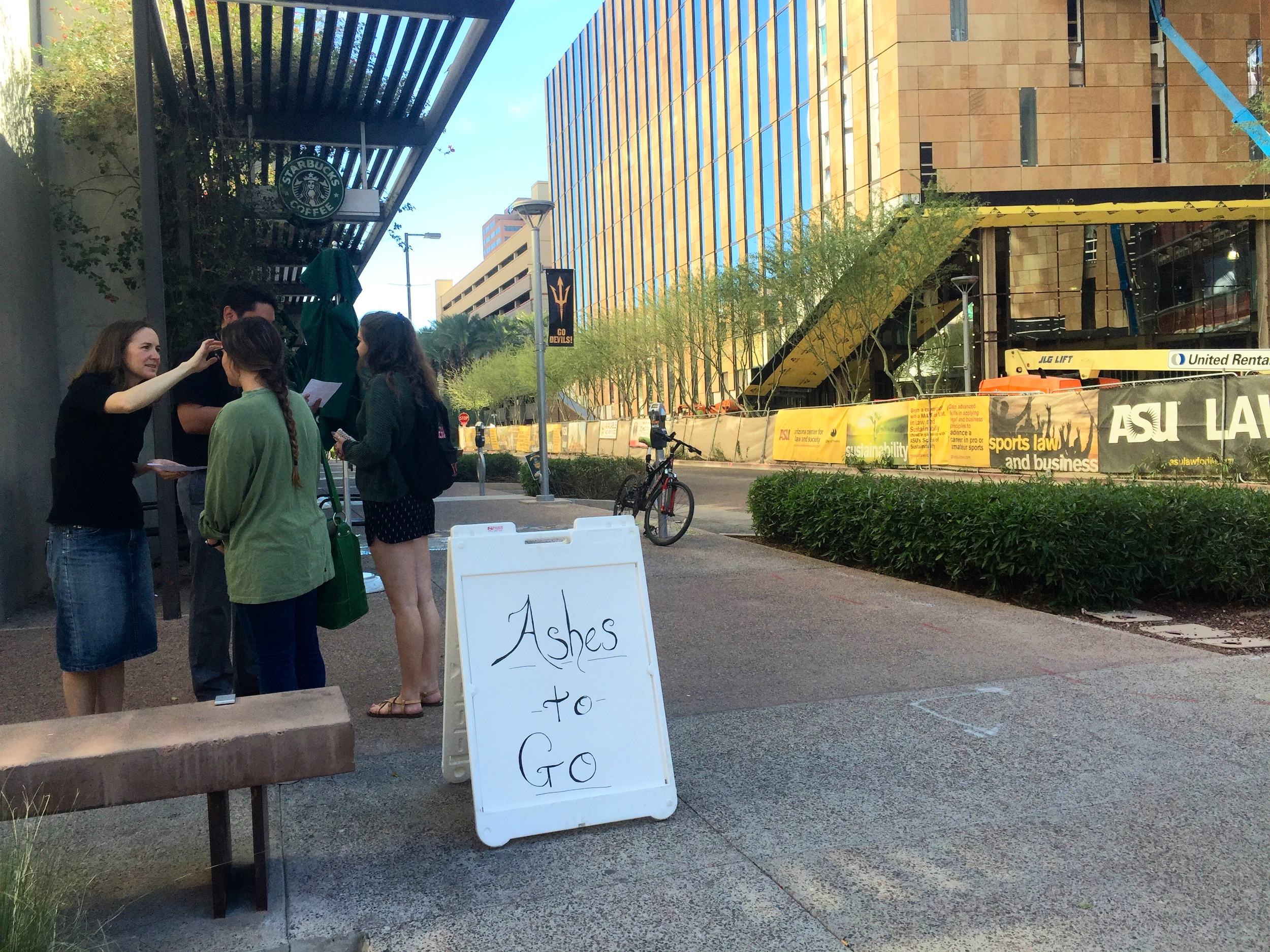 Pastor Sarah and Interno Abel at Taylor Place, downtown Phoenix, as part of our Ashes to Go event .